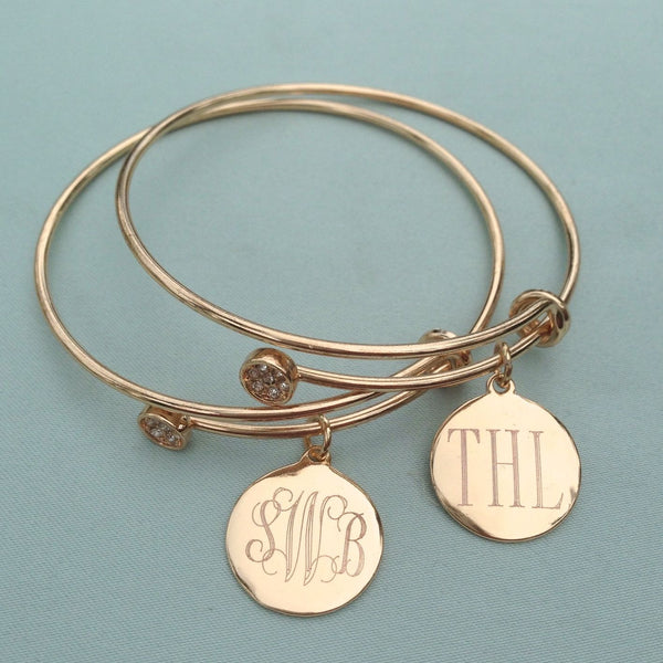 Our Monogram Disc Charm Bangle Bracelet is a classic style for any age. I Love Jewelry Auctions has all of your personalized jewelry needs!