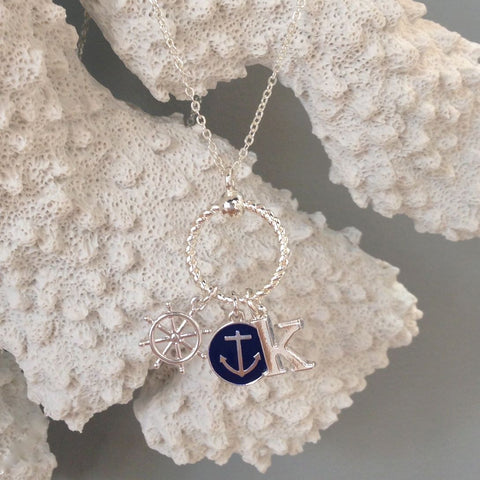 Our favorite Nautical Navy Anchor & Silver Initial Charm Necklace is a sassy summer style that screams preppy chic!